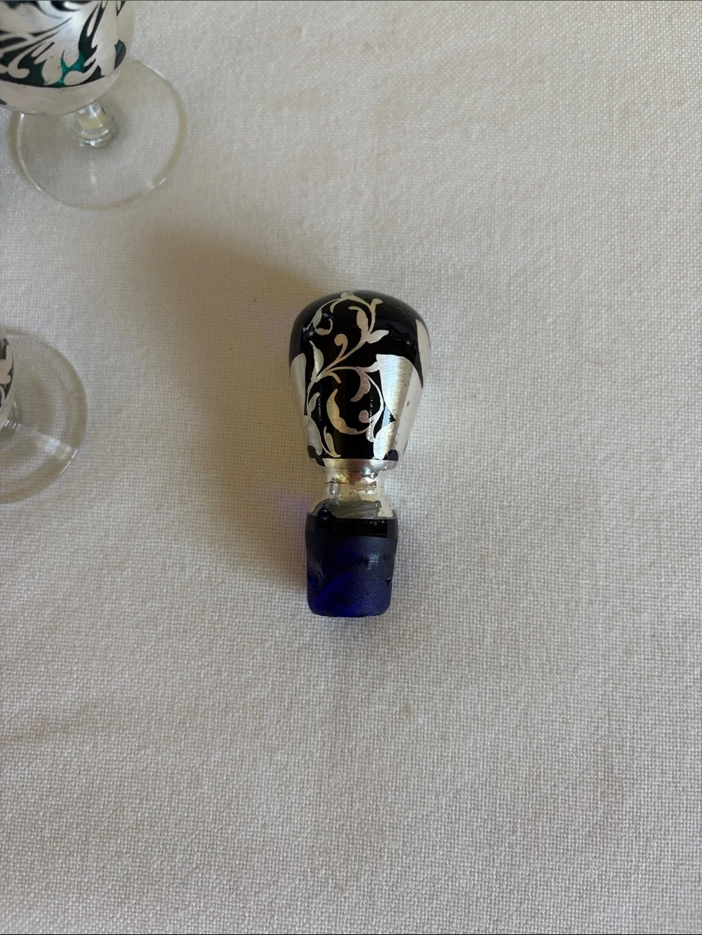 Cobalt blue glass with sterling silver over lay decanter.